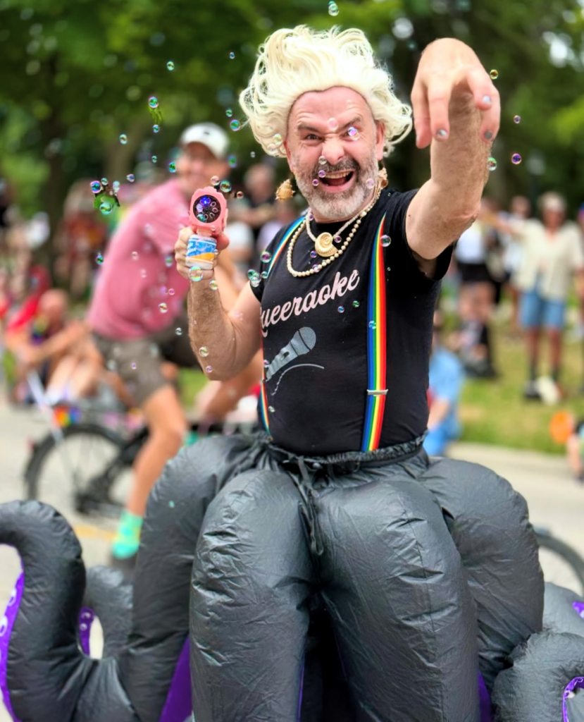Pride Parade Queeraoke participant dressed as Ursula the Sea Witch